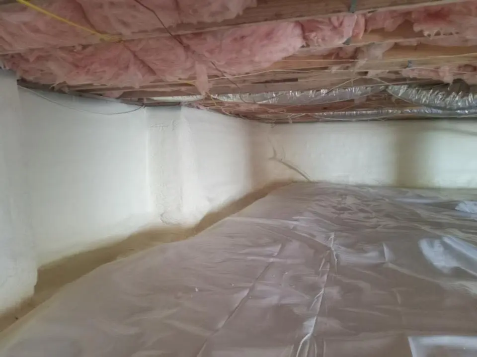 Crawl space encapsulation with closed-cell spray foam for Commercial Roof Restoration in Sandwich